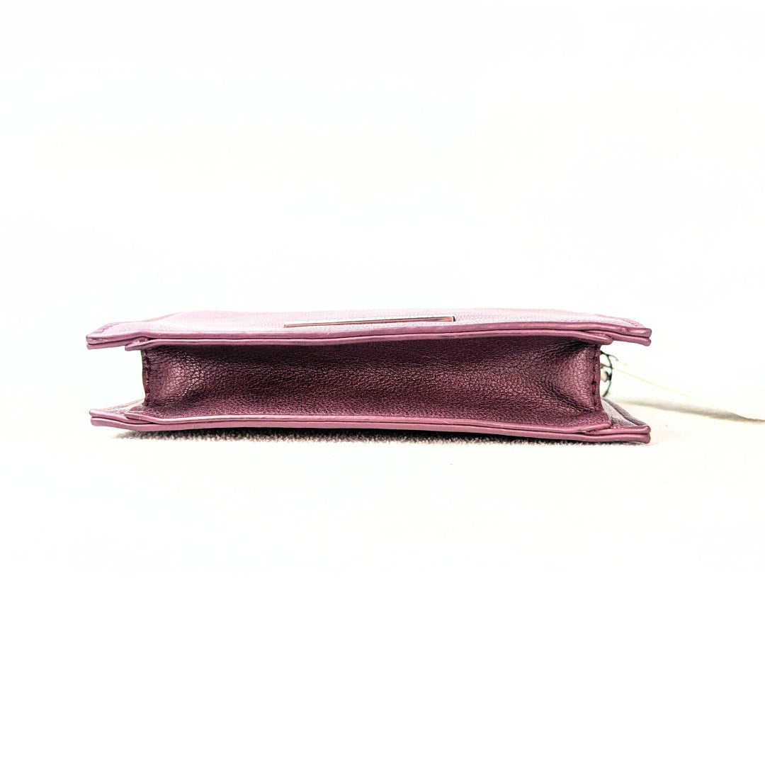 BCBGeneration Shelya Studded Crossbody Bag in Plum photographed from the bottom side