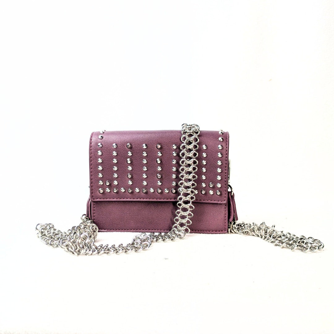 BCBGeneration Shelya Studded Crossbody Bag in Plum photographed from the front side