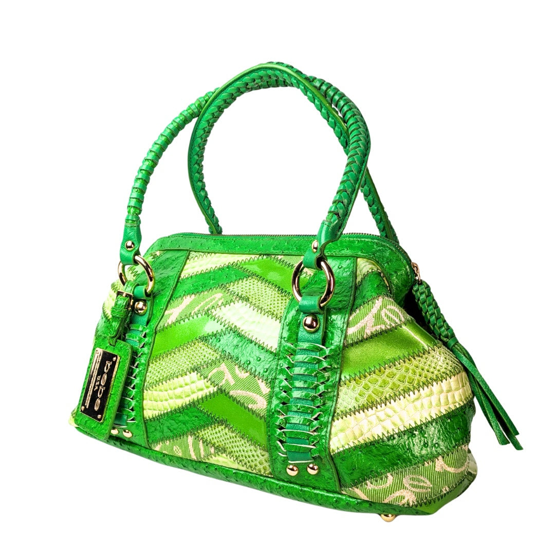 Bebe Patchwork Leather Tote in Green photographed form the left side.