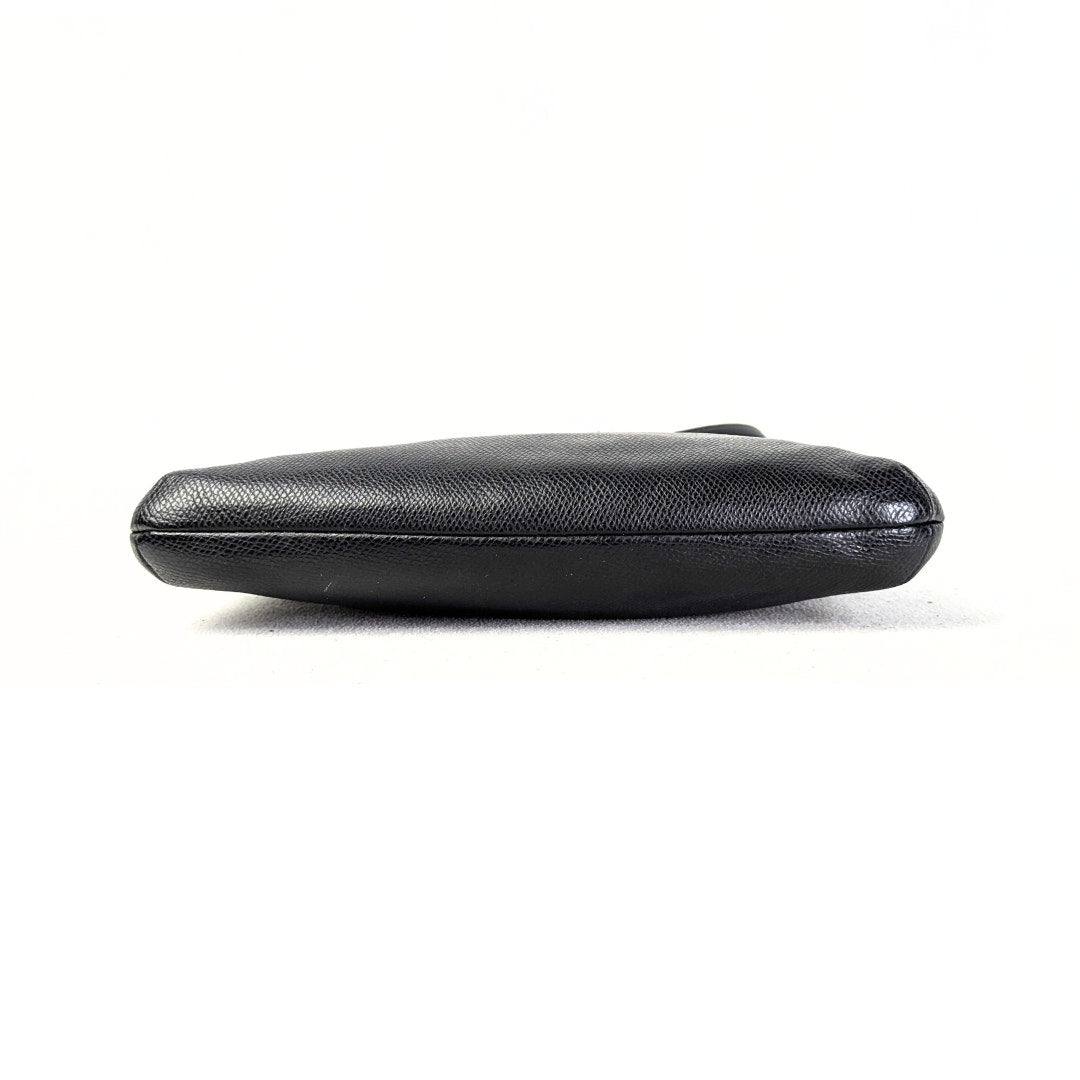 The bottom view of the COACH Polly Crossgrain Leather Crossbody Bag photographed on the white background.