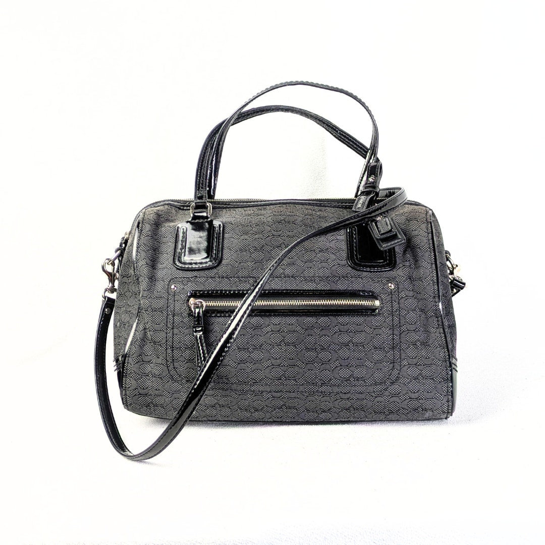 The fornt view of the COACH Poppy Mini Oxford Convertible Satchel Handbag captured on the white background.