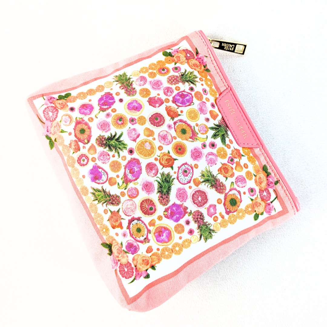 The view of the Estée Lauder Small Citrus Fruits Print Makeup Bag captured from the top on the white background.