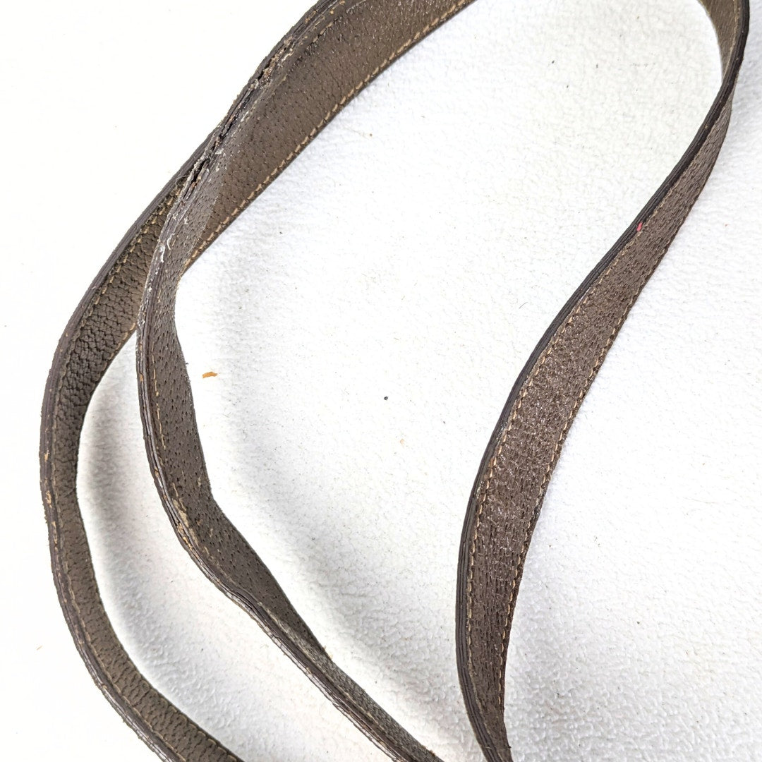 Crossbody strap of the GUCCI Monogram Coated Canvas Crossbody Bag .