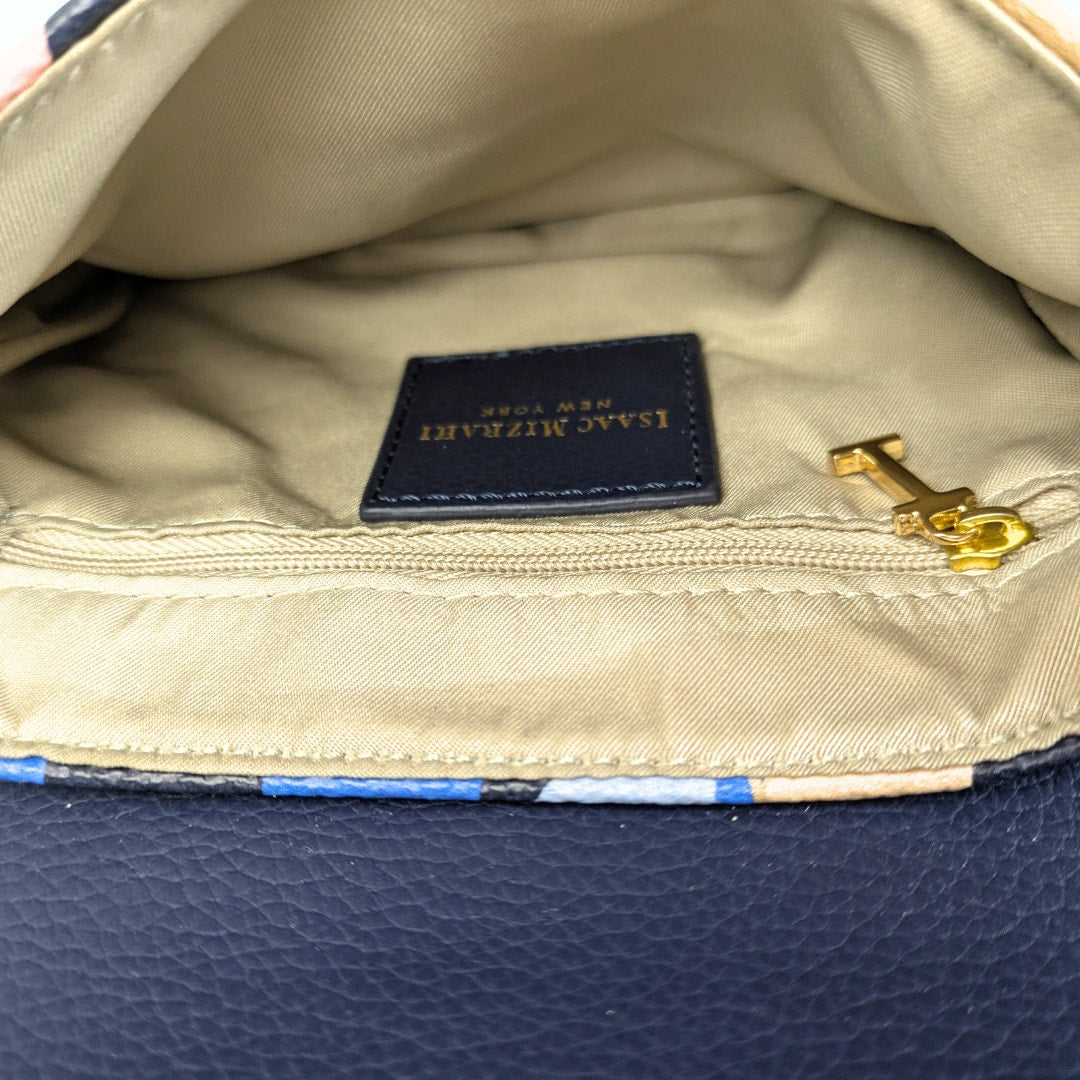 The view of the inside of the Isaac Mizrahi Floral Print Faux Leather Crossbody Bag.