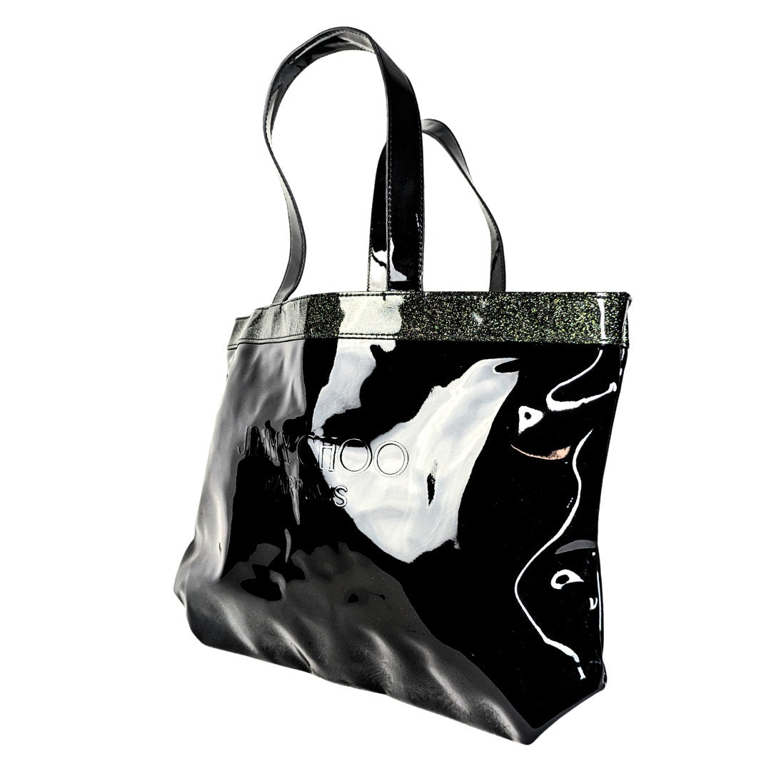 A pre-owned Jimmy Choo Parfums open top tote shoulder bag with black vinyl and glittery finishes, featuring two shoulder straps and an embossed logo on the front.