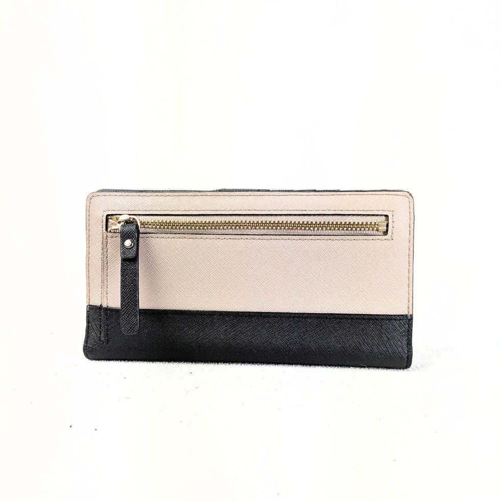 The view of the back side of the Kate Spade Laurel Way Stacy Bi-fold Wallet.