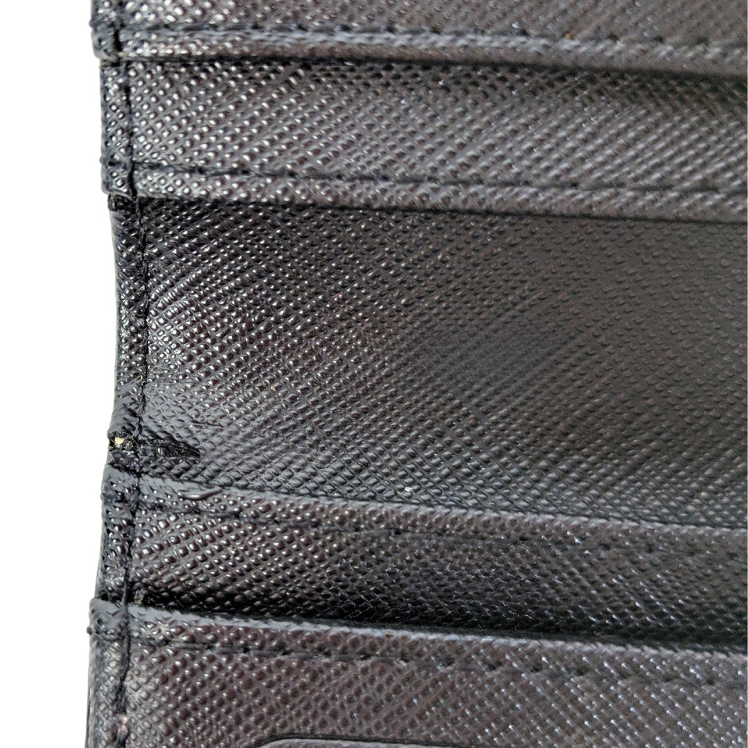 The view of the side crack on the interior side of the Kate Spade Laurel Way Stacy Bi-fold Wallet.