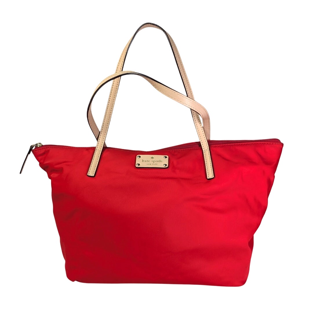 The front view of the Kate Spade May Street Lida Large Tote Shoulder Bag in Red on the white background.