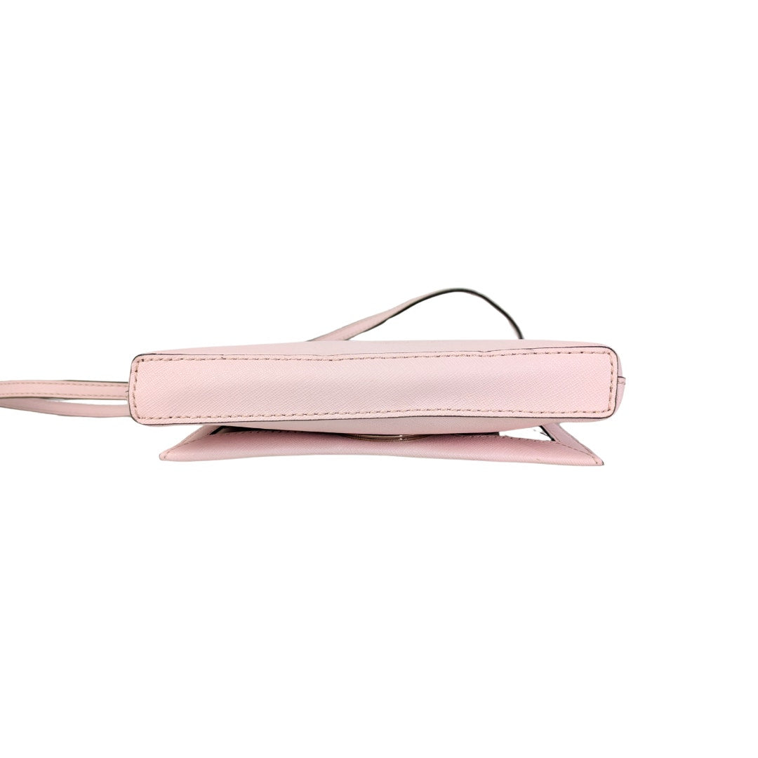 The view of the bottom of the Kate Spade New York Newbury Lane Sally Crossbody Bag, captured on the white background.