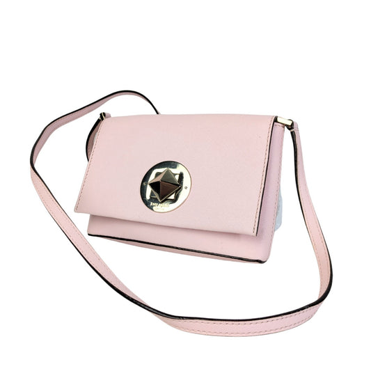 A pre-owned Kate Spade New York Newbury Lane Sally Crossbody Bag in blush pink saffiano leather with silver hardware.