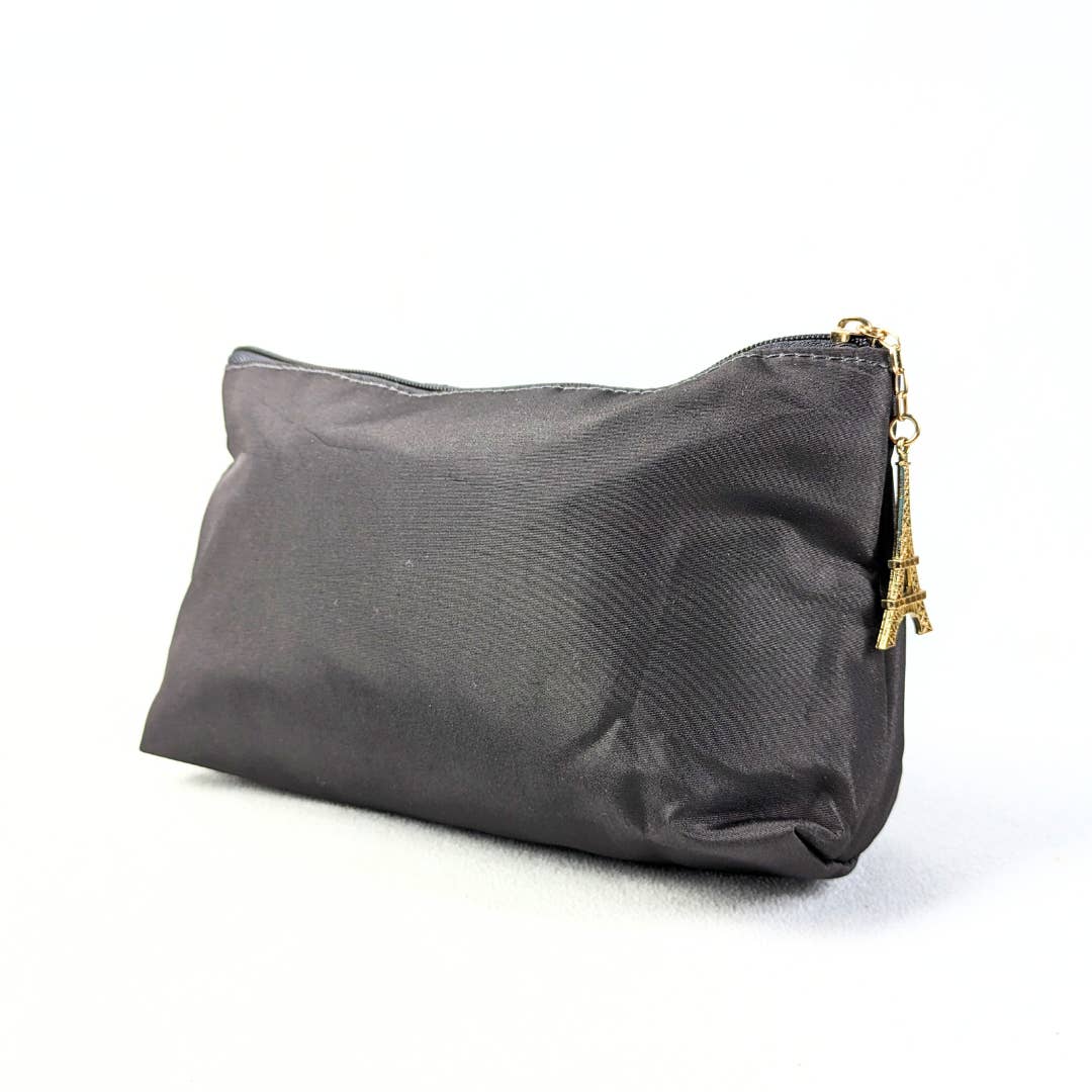 The back side of the Lancôme Nylon Cosmetic Bag with Eiffel Tower Zipper Handle, photographed on the white background.