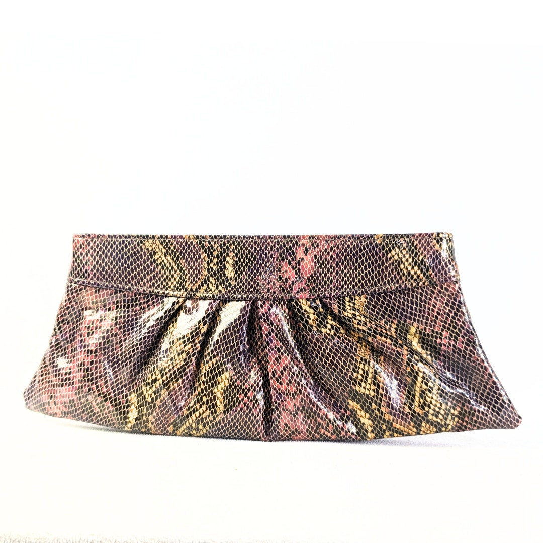 The front side of the Lauren Merkin Python Skin Pattern Faux Leather Clutch.