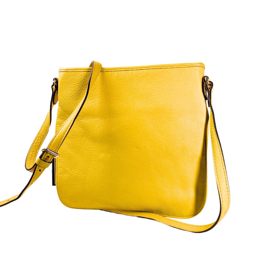 The back view of the Lauren Ralph Lauren Governors Lodge Flat Leather Crossbody Bag in Yellow.