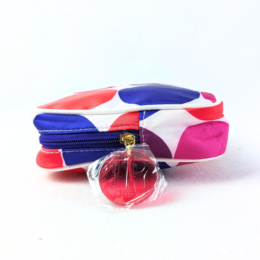 The view of the right side of the Lisa Perry for Estée Lauder Geometric Print Make-up Bag, photographed on the white background.