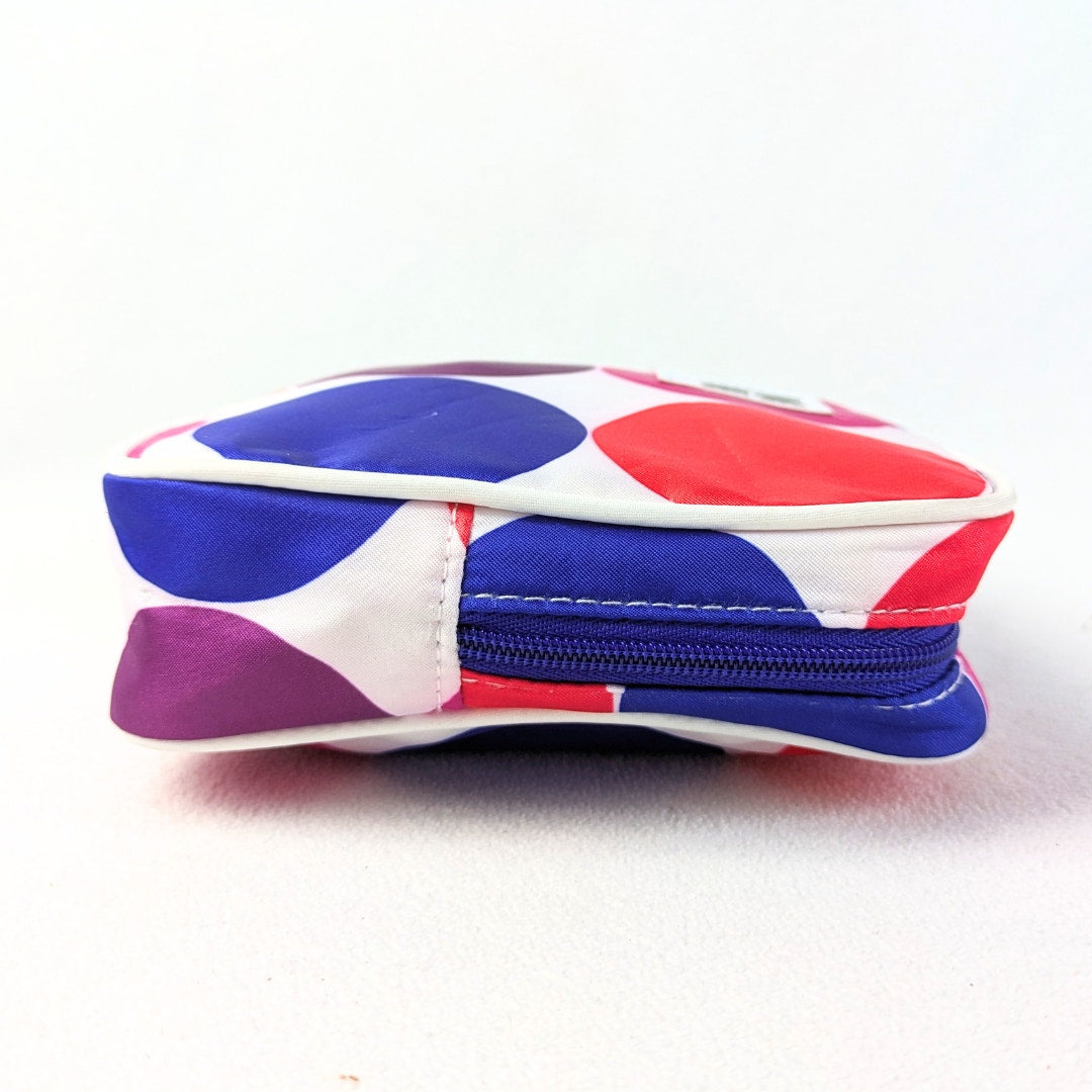 The view of the left side of the Lisa Perry for Estée Lauder Geometric Print Make-up Bag, photographed on the white background.