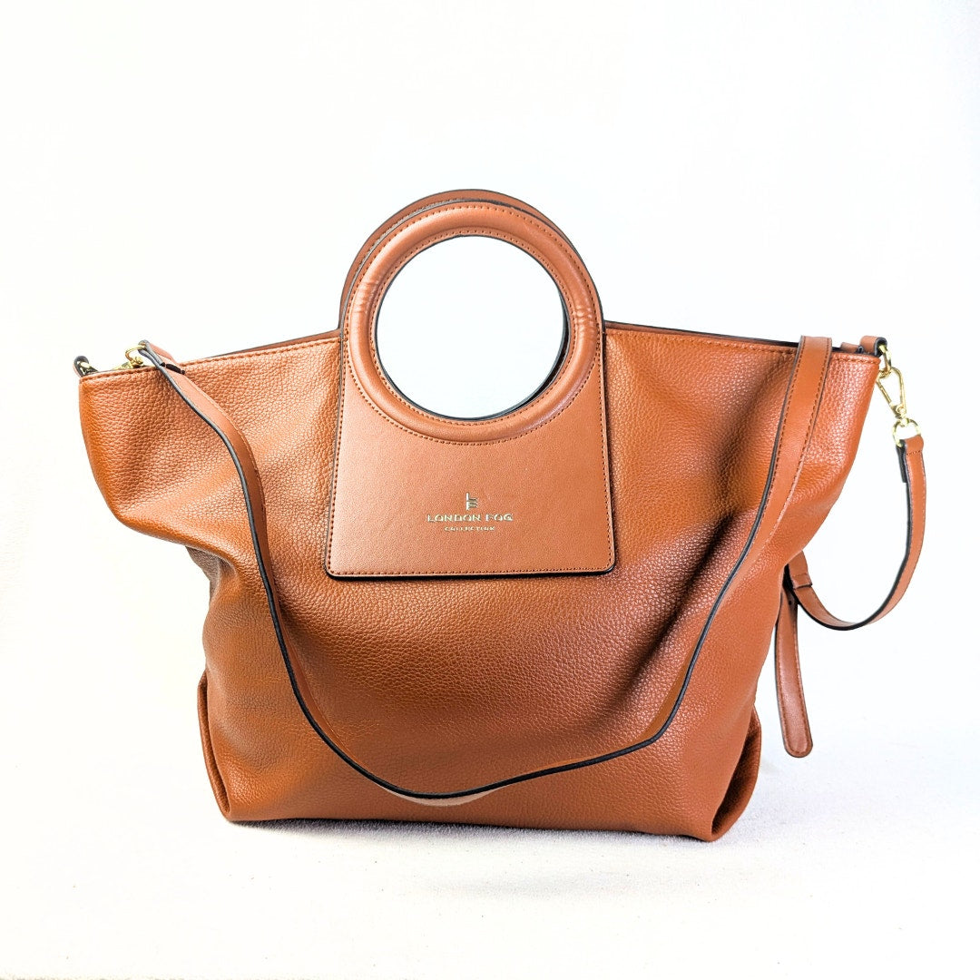 The font view of the London Fog Faux Leather Crossbody / Shoulder Handbag in Camel on the white background.