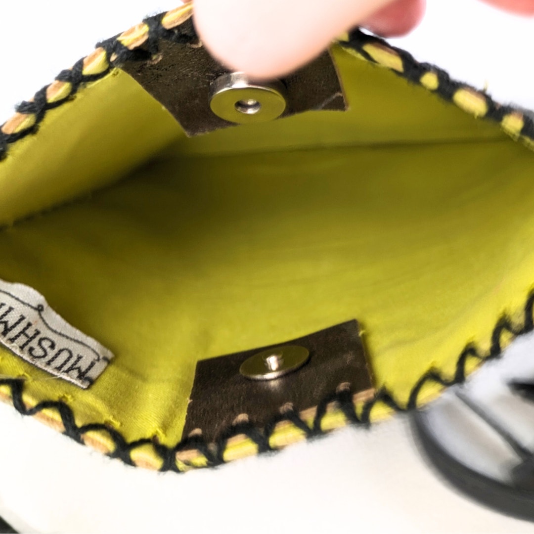 The close-up view of the MUSHMINA Metallic Gold Faux Leather Crossbody Bag captured on the white background.