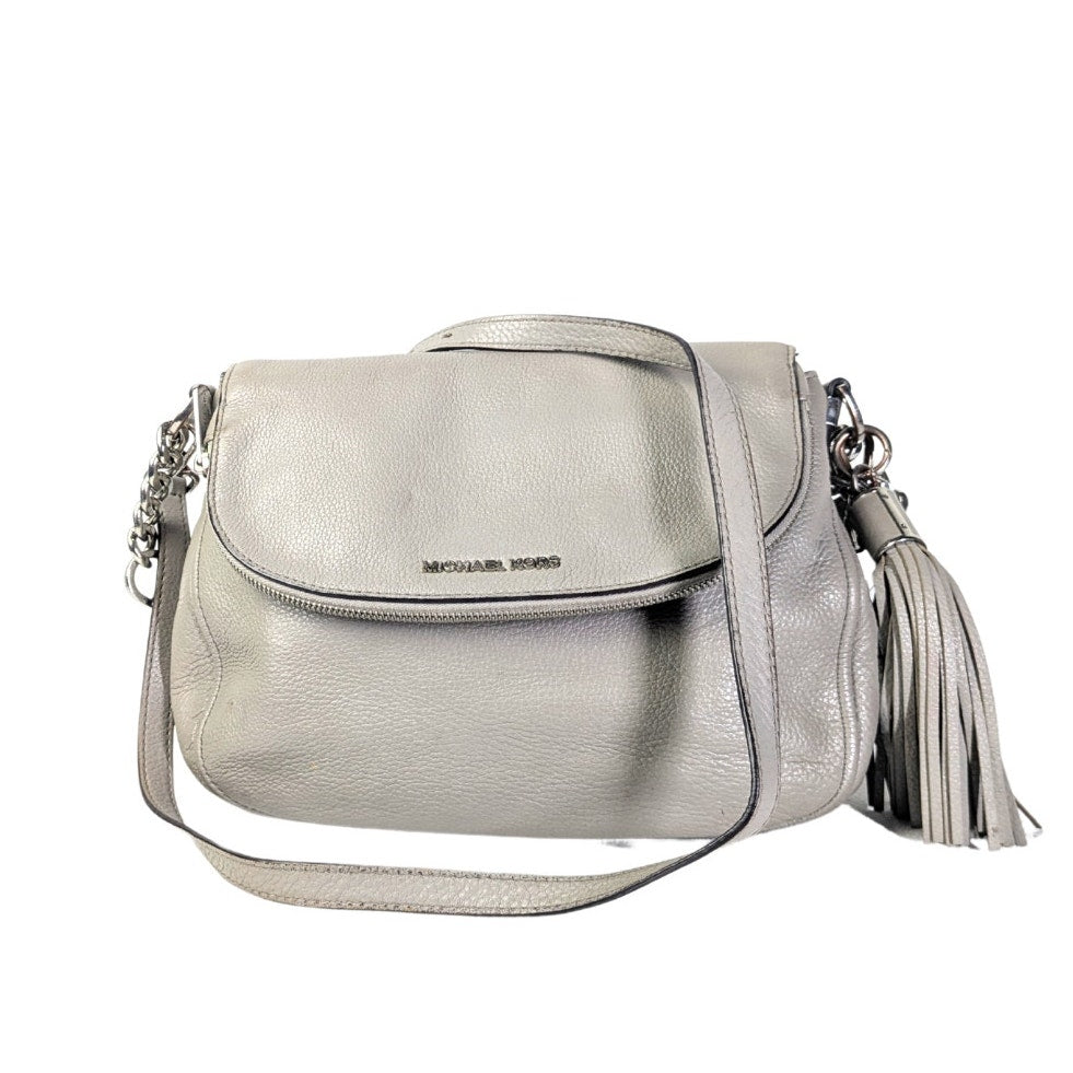 The front side of the Michael Kors Bedford 2-way Convertible Crossbody Bag in gray, photographed on the white background.