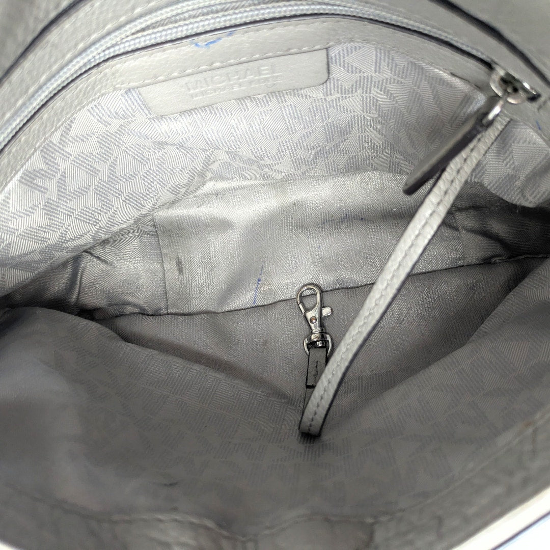 The view of the inside of the Michael Kors Bedford 2-way Convertible Crossbody Bag.