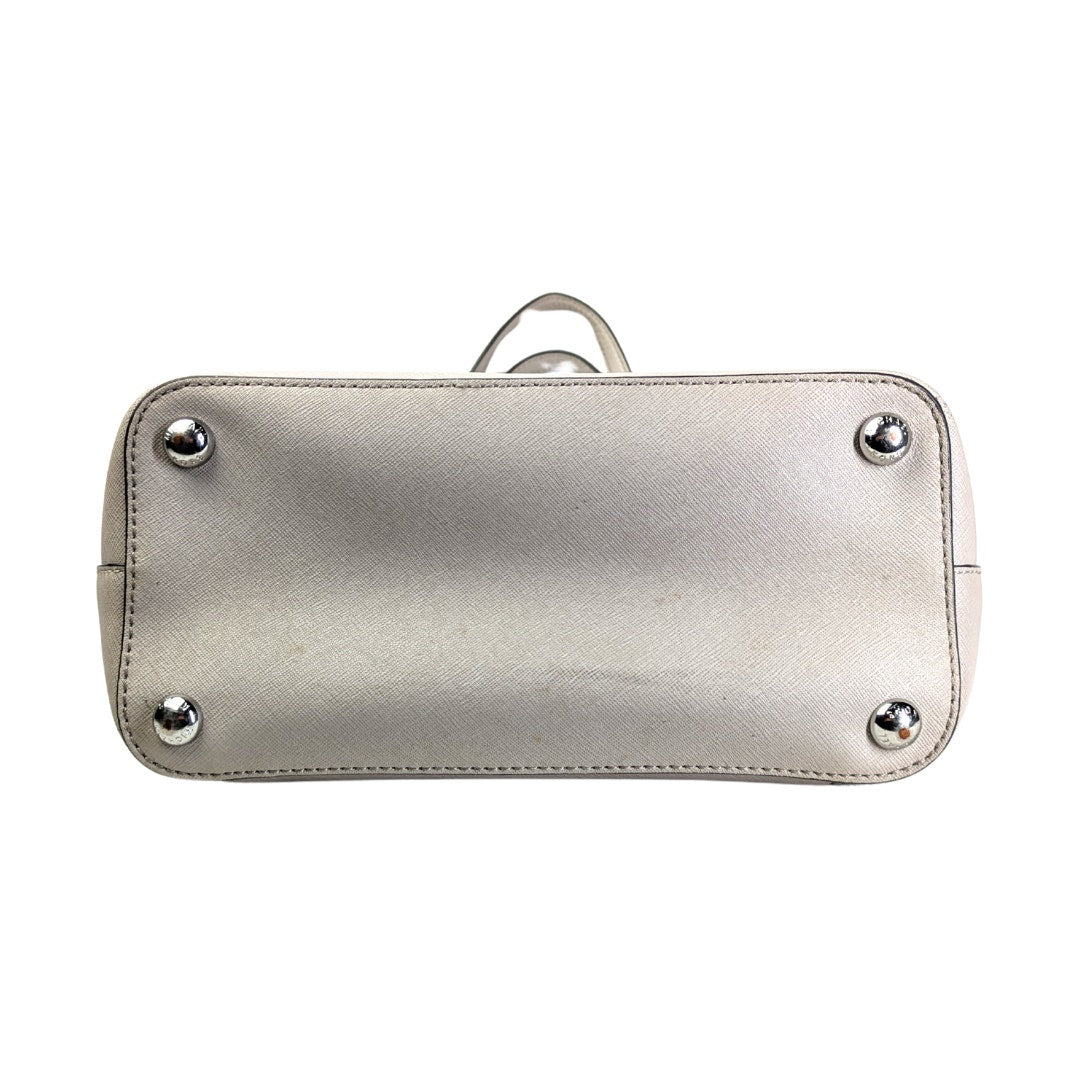 The bottom of the Michael Kors Jet Set Medium Saffiano Leather Tote.