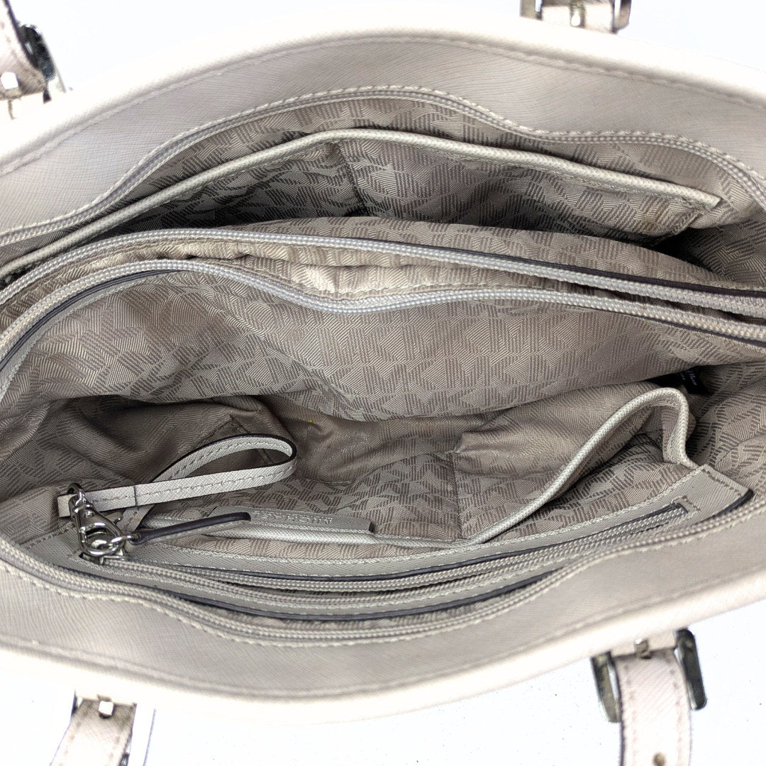 The view of the interior of the Michael Kors Jet Set Medium Saffiano Leather Tote.
