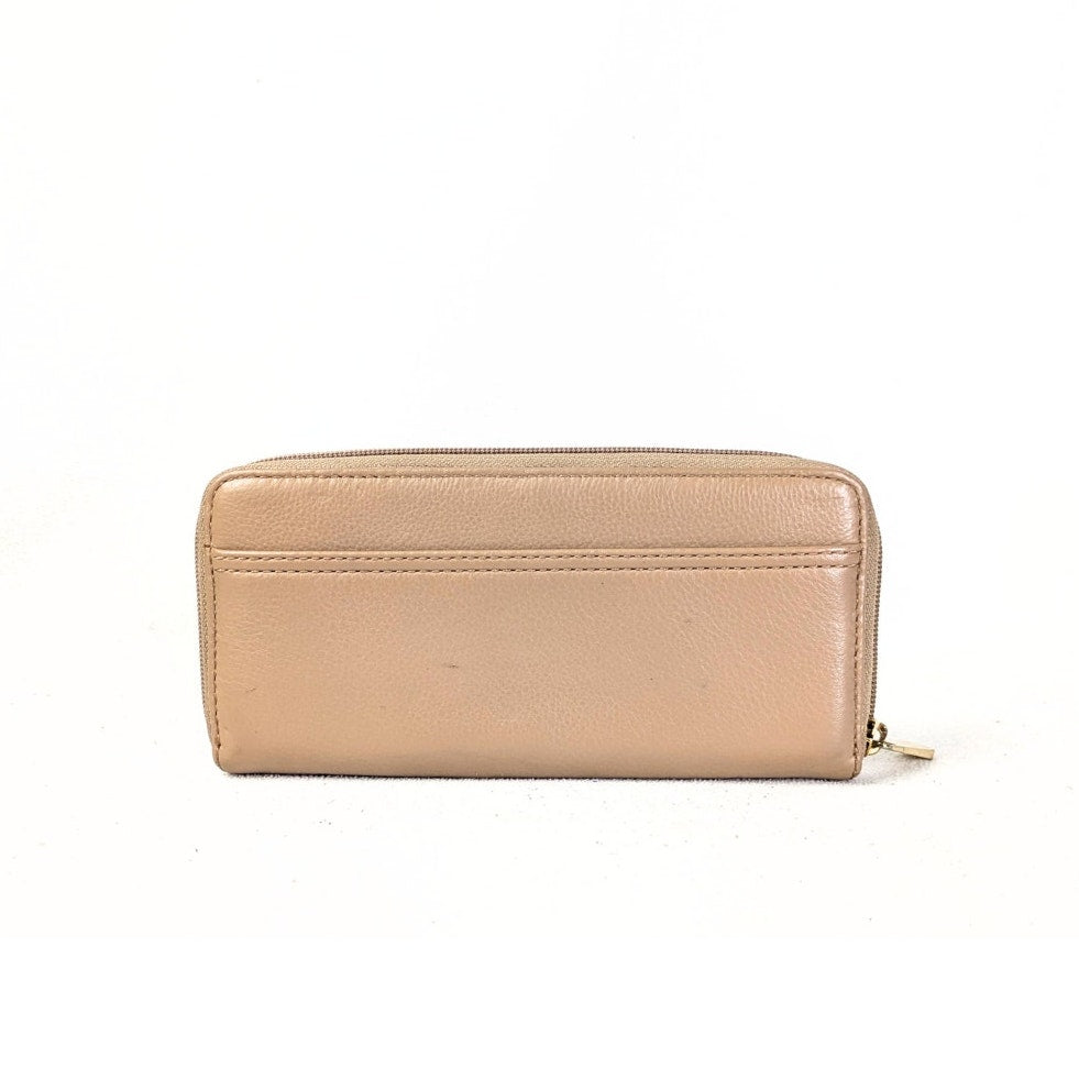 The back side of the Michael Kors Saratoga Zip Around Continental Wallet photographed on the white background.