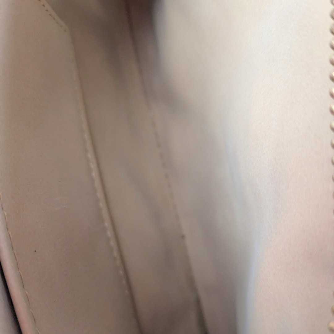 The interior of the Michael Kors Signature MK Belt Wallet Waist Bag.