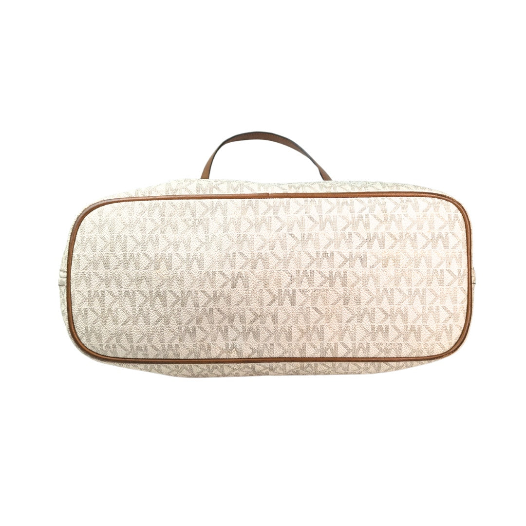 The bottom of the Michael Kors Signature Raven Large North South Top Zip Tote on the white background.