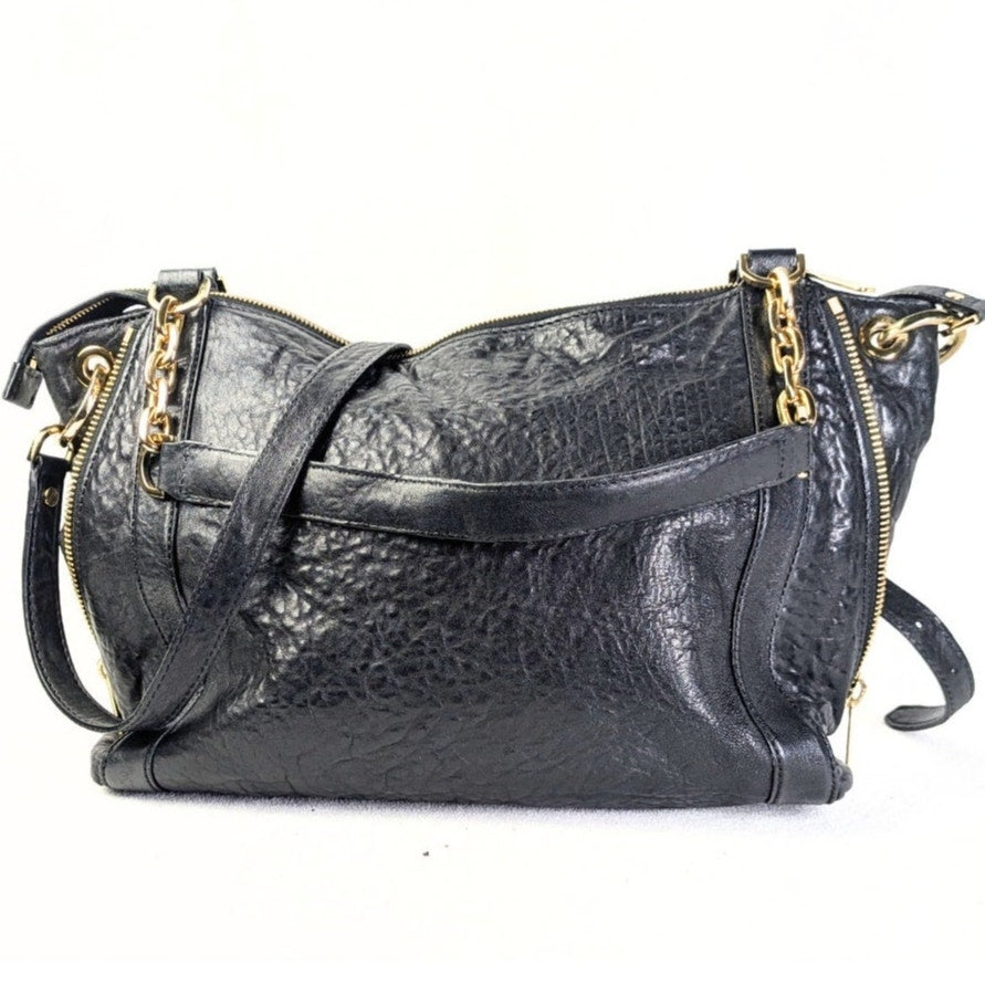 The back view of the Michael Kors Stanthorpe Leather Rectangle Tote Handbag.
