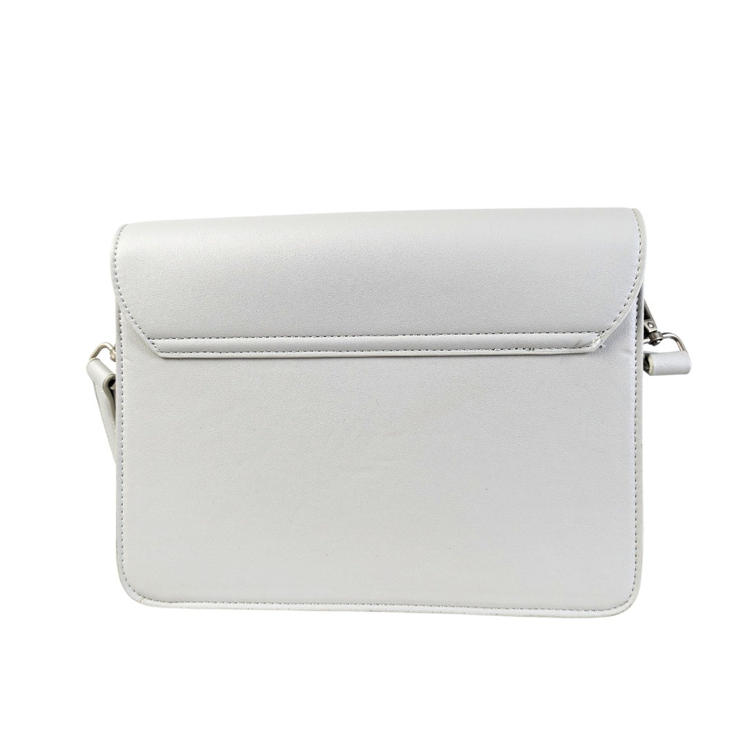 The back side of the Pixie Mood Zoe Crossbody Vegan Leather Shoulder Bag photographed on the white background.