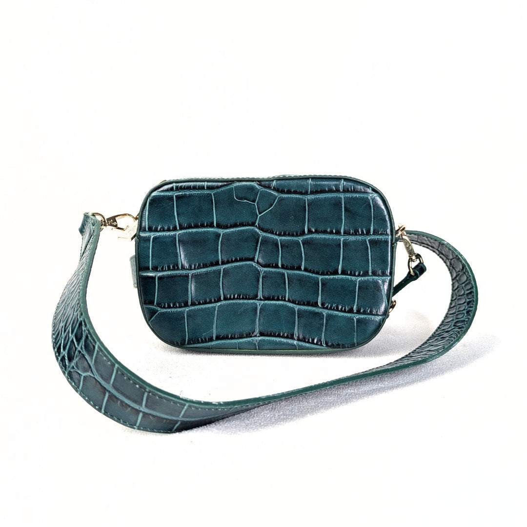 The front side of the Pop & Suki Crocodile Embossed Leather Camera Crossbody Bag, captured on the white background.