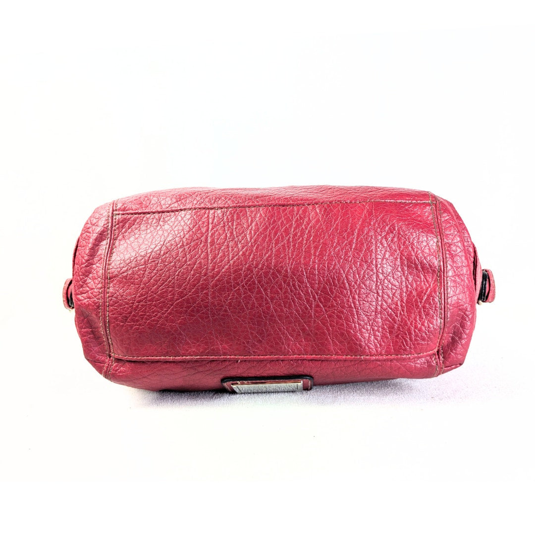 The bottom of the Pre-loved Rosetti Faux-Leather Hobo Shoulder Bag.