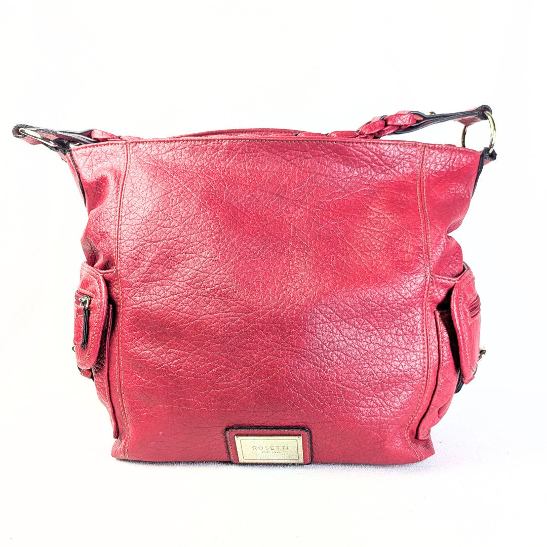 A front view of the Pre-loved Rosetti Faux-Leather Hobo Shoulder Bag in Burgundy on a white background.