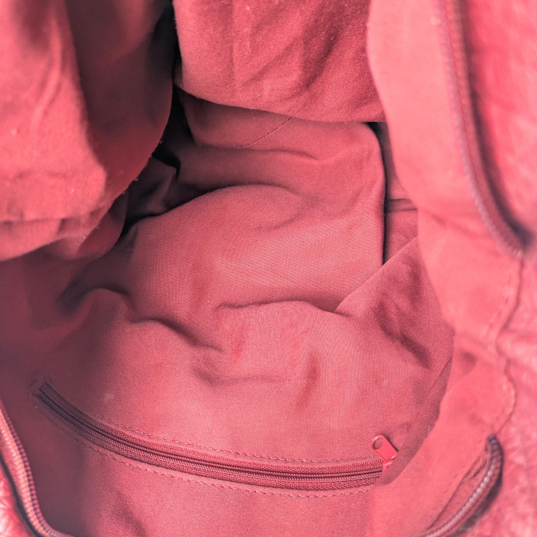 The view of the interior of the Pre-loved Rosetti Faux-Leather Hobo Shoulder Bag.