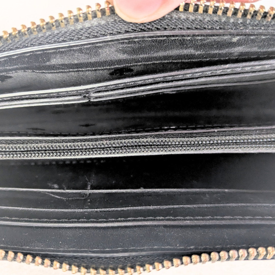 The videw of the interior of the Pre-owned Kate Spade Larchmont Avenue Alegra Crossbody Bag.