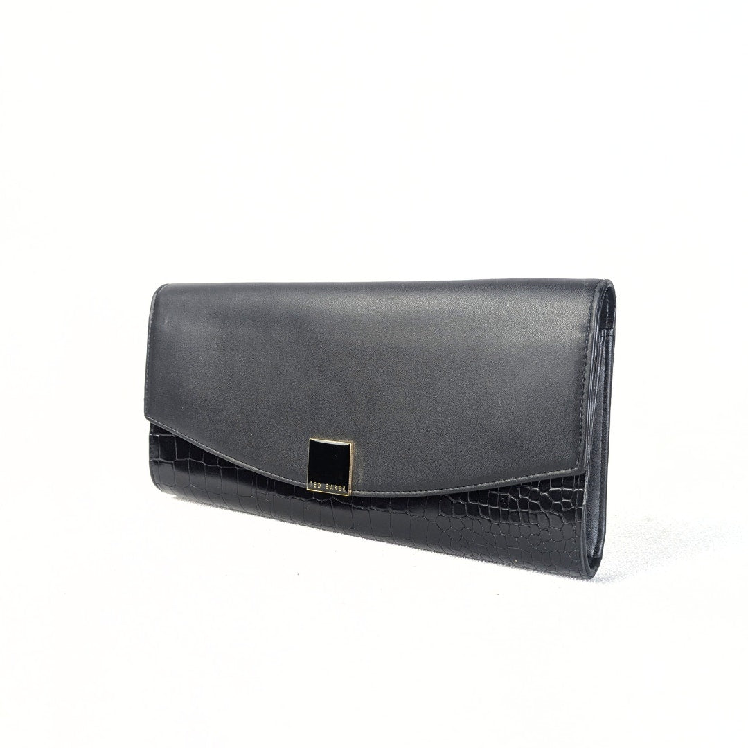 A black crocodile embossed leather envelope evening clutch bag with a metal clasp closure.
