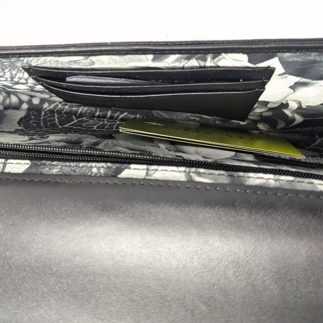 The view of the inside of the Ted Baker Crocodile Embossed Leather Envelope Evening Clutch Bag.