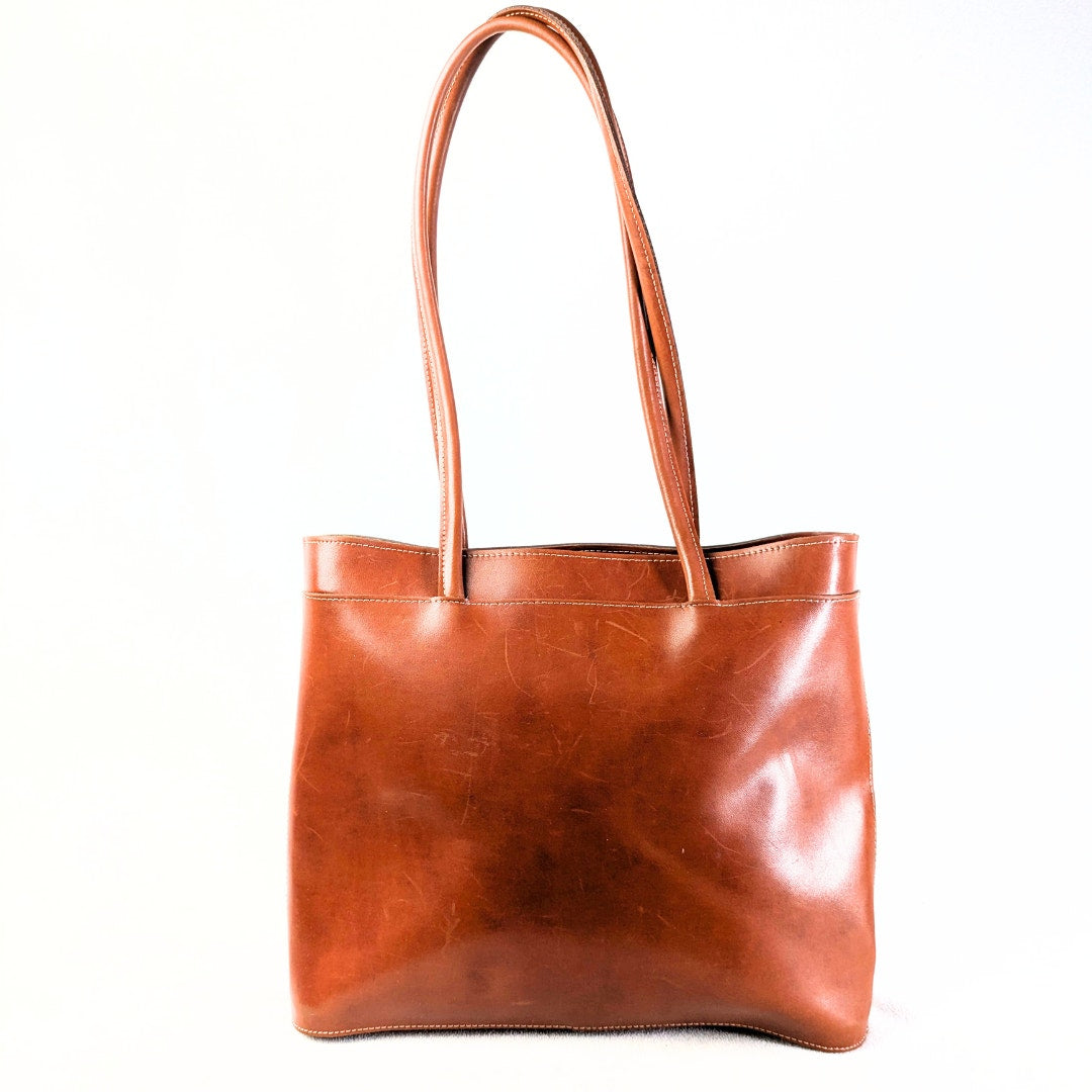 Vintage Cognac Vegan Leather Shoulder Bag photographed from the front side.