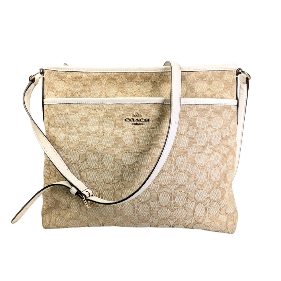 The front of the COACH Signature Jacquard Crossbody Bag.