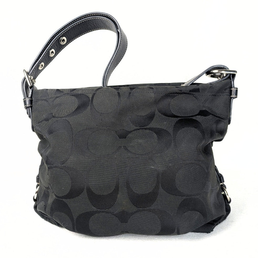 The front side of the Coach Monogram Hobo Shoulder Bag, captured on the white background. 