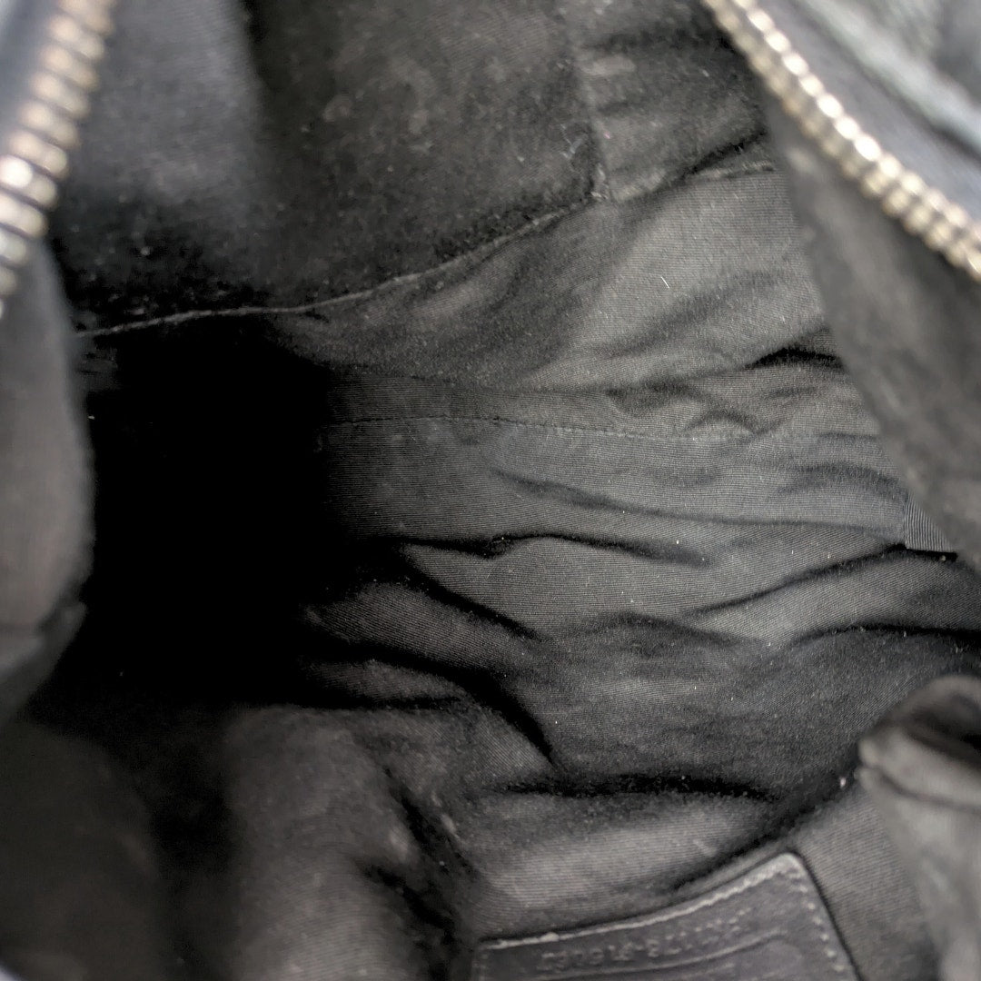 The interior of the Coach Monogram Hobo Shoulder Bag.