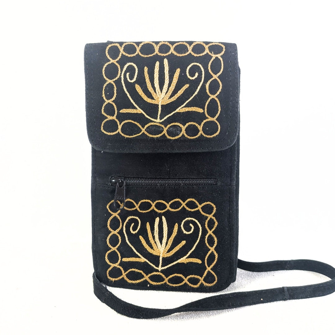 Handmade Convertible Soft Suede Embroidered Bag photographed from the front side. 