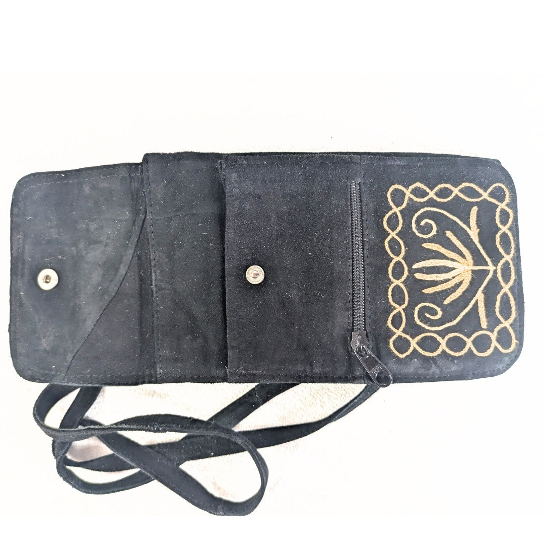 Handmade Convertible Soft Suede Embroidered Bag photographed inside the bag. 