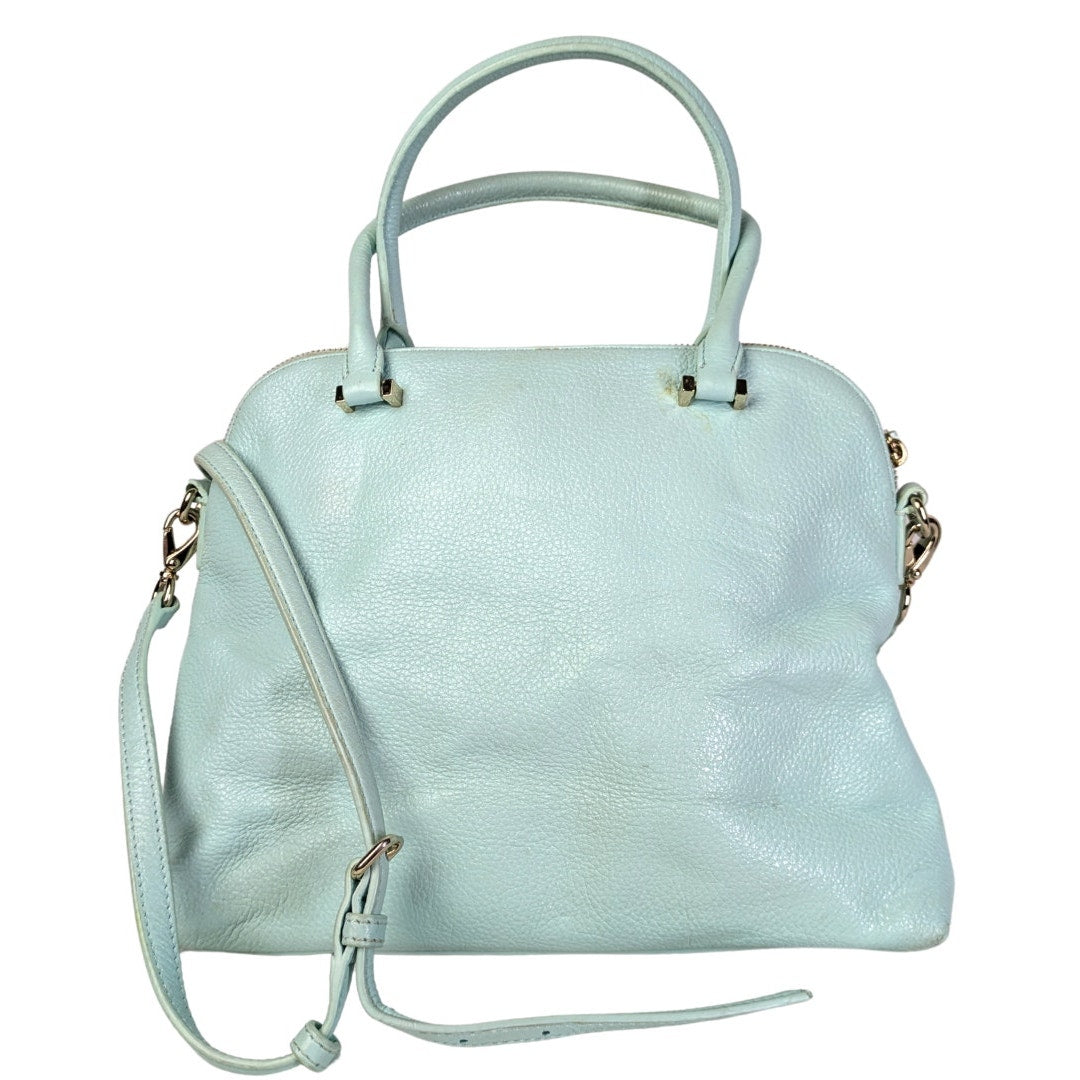 The back side fo the Kate Spade Emerson Place Margot Crossbody Satchel Bag in turquoise, captured on the white background. 
