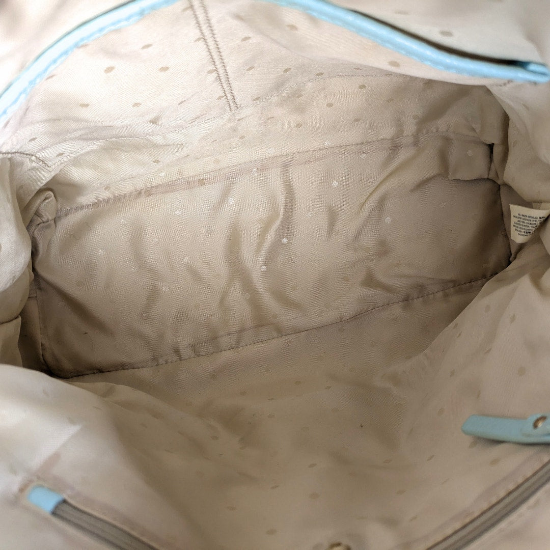 The inside of the Kate Spade Emerson Place Margot Crossbody Satchel Bag.