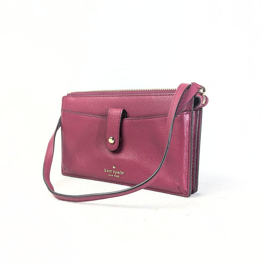 The view of the Burgundy Kate Spade Larchmont Avenue Alegra Crossbody Bag on the white backgorund. 