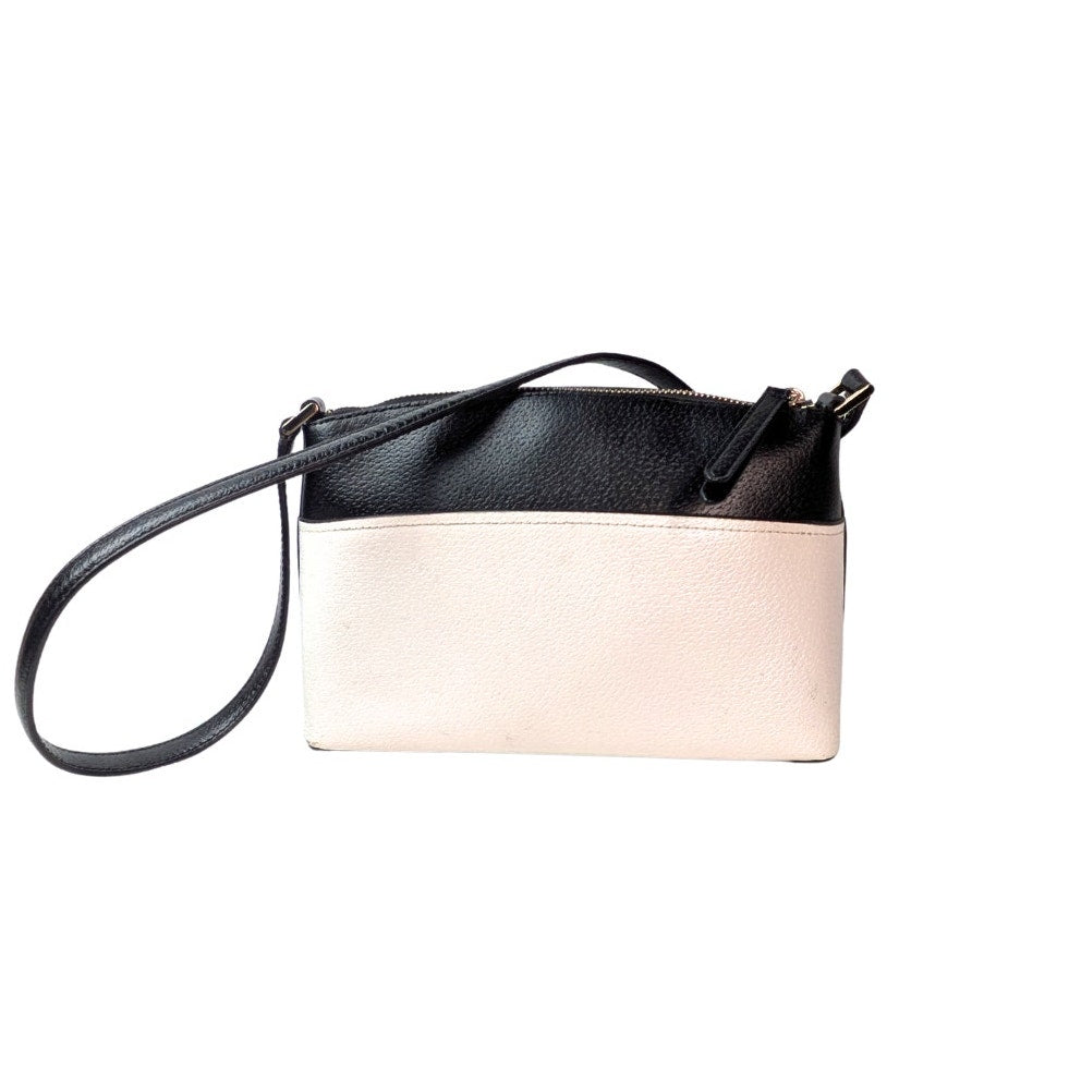 The back side fo the Kate Spade New York Millie Grove Street Crossbody Bag in White and Black, photographed on the white background. 