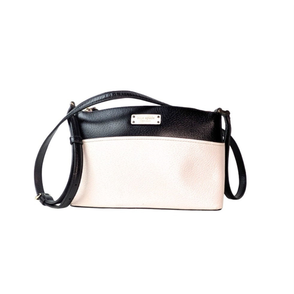Front side of the Kate Spade New York Millie Grove Street Crossbody Bag in White and Black, captured on the white background.