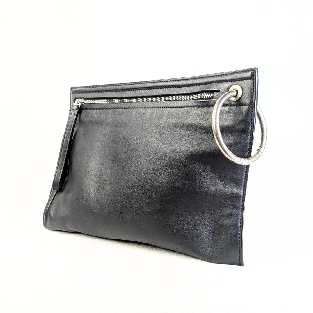 Marc by Marc Jacobs Handbag Prism Clutch in Black photographed form the left side. 