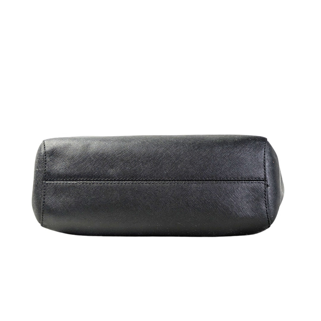 The bottom of the Michael Kors Jet Set Saffiano Leather Tote Bag in Black.